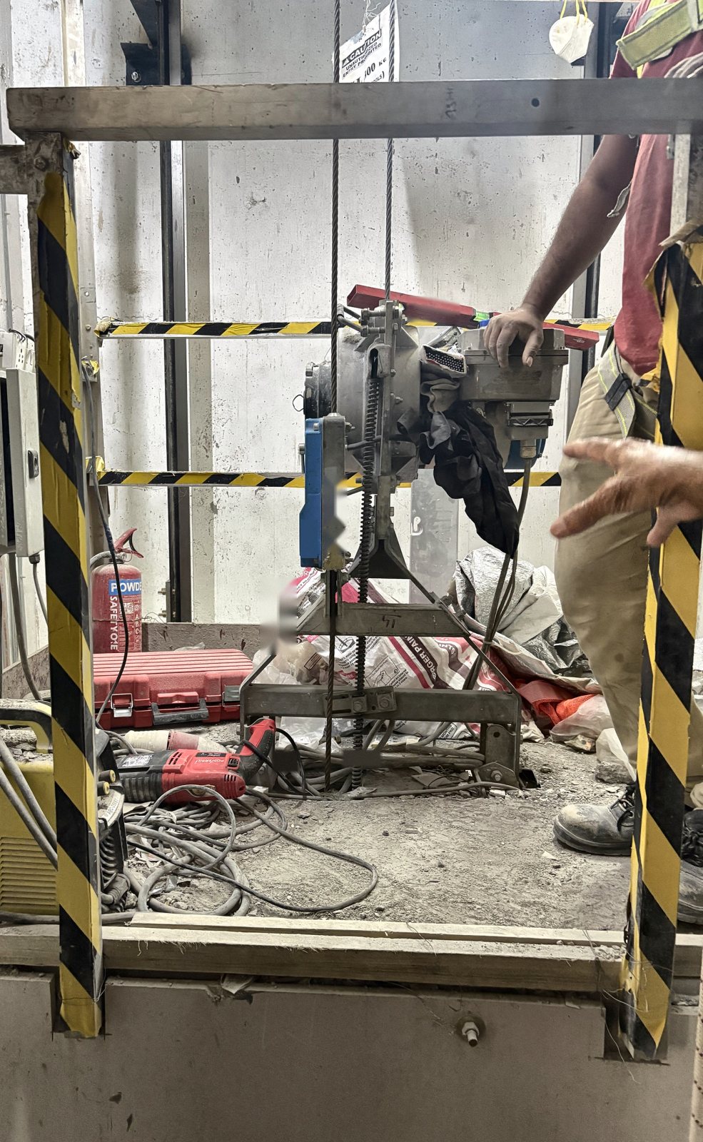 Front of the false car showing the hoist, control box and fire extinguisher